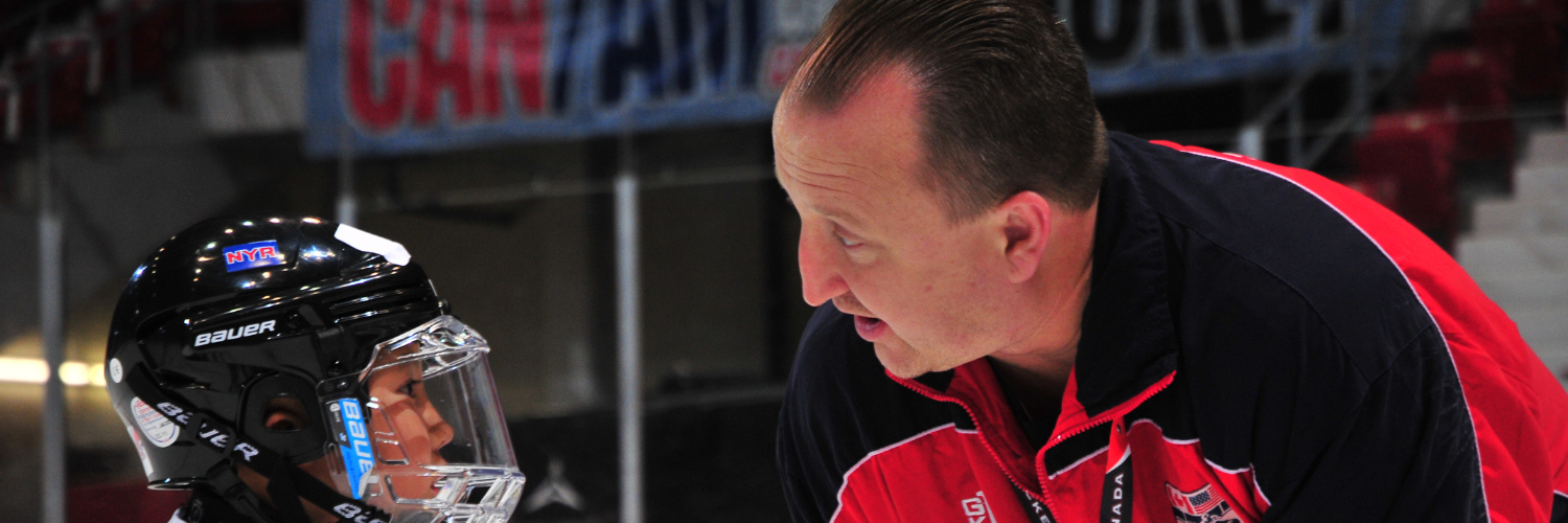 Coach Chatting with Camper